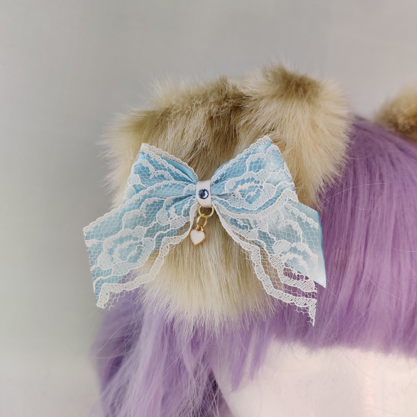 Spotted puppy ears w/ pastel blue bows