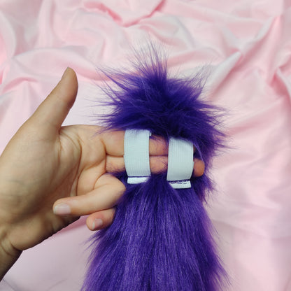 Purple curly puppy tail